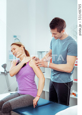 Nice good looking woman feeling pain in the shoulder Nice good looking woman feeling pain in the shoulder 53148705