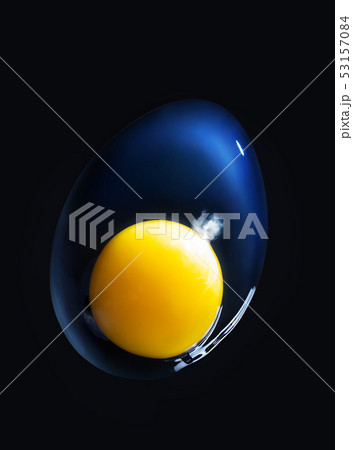 Raw broken egg closeup on black background. Macro. The concept of the origin of life 53157084