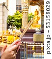 Incense,Young woman praying hand on Temple,Backgro 53158029