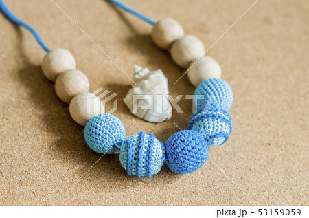 Necklace made from knitted beads and toys for the Necklace made from knitted beads and toys for the 53159059