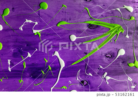 Artist working wooden table top with paint  marks 53162161