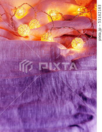 Garland background with ball lights on the folds 53162163