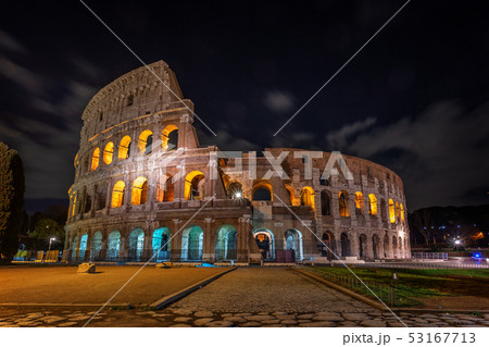 Colosseum architectural structure at night, in Rome. Colosseum architectural structure at night, in Rome. 53167713