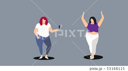 fat woman using smartphone camera girl taking photo of young overweight female model fashion shoot 53168115