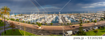 Menton. Panoramic view of the harbor with yachts and the city embankment. Menton. Panoramic view of the harbor with yachts and the city embankment. 53169266