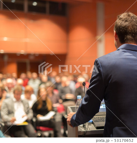 Public speaker giving talk at Business Event. 53170652