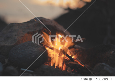Inviting campfire on the beach during the summer 53170911