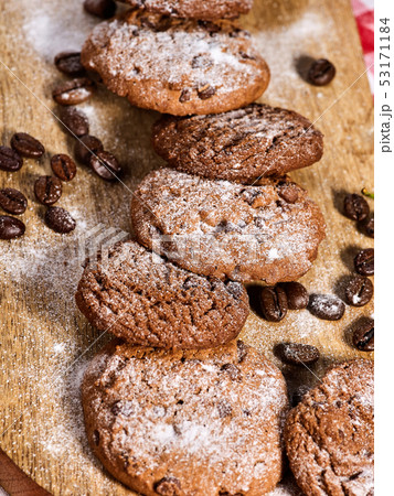 Oatmeal chocolate cookies with coffee grains and cherry. Sun flare 53171184