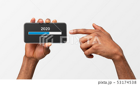 Man's hands holding smartphone on white 53174538