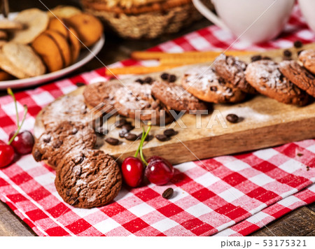 Oatmeal chocolate cookies snack and cherry cupcake breakfast Oatmeal chocolate cookies snack and cherry cupcake breakfast 53175321