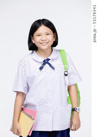 Cute girl in student's uniform with stationery on 53176341