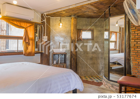 White Bed and Sink and Faucet in Country Loft White Bed and Sink and Faucet in Country Loft 53177674