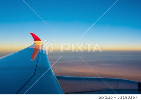 View from airplane window to see sky. 53180367