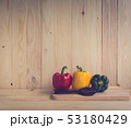 sweet peppers on wooden table background 53180429