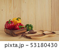 sweet peppers on wooden table background 53180430