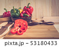 sweet peppers on wooden table background 53180433