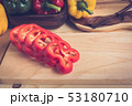 sweet peppers on wooden table background 53180710