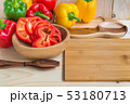sweet peppers on wooden table background 53180713