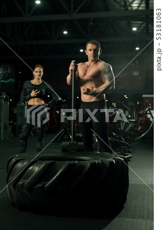 Sporty couple view in a gym Sporty couple view in a gym 53181063