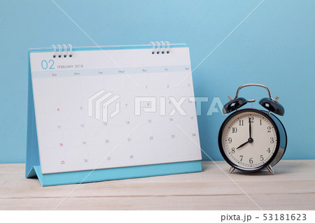 Vintage clock and calendar February on wood 53181623