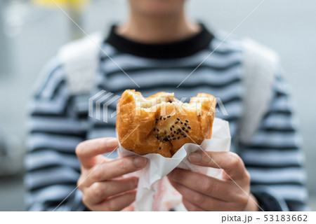 woman eat traditional Taiwanese snack 53183662