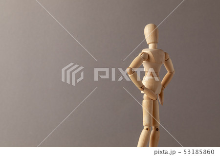 The man turned his back, displeased, on a gray background. Copy space for text. The man turned his back, displeased, on a gray background. Copy space for text. 53185860