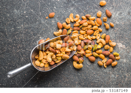 Spicy flavoured nuts. Mix of nuts. 53187149