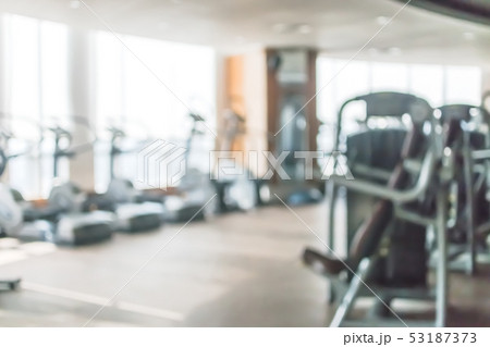 Gym blur background fitness center workout studio 53187373