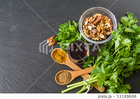 Georgian sauce ingredients on dark stone background 53189606