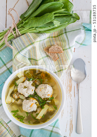 Sorrel soup in white bowl 53189735