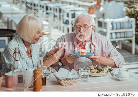 Amazing mature female taking photo on her telephone Amazing mature female taking photo on her telephone 53191070