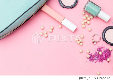 cosmetics and accessories on a pink background 53192212