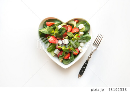 Fresh salad of strawberry, celery, spinach, pine. 53192538