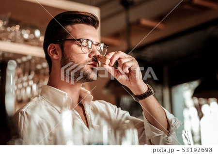 Close up of brunette man that working in bar Close up of brunette man that working in bar 53192698