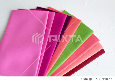 A Group of Twisted Colored Fabric on white 53194077