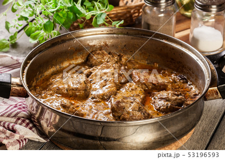 Pork tenderloin in mushroom sauce 53196593