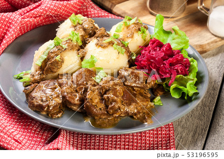 Pork tenderloin in mushroom sauce with boiled Pork tenderloin in mushroom sauce with boiled 53196595