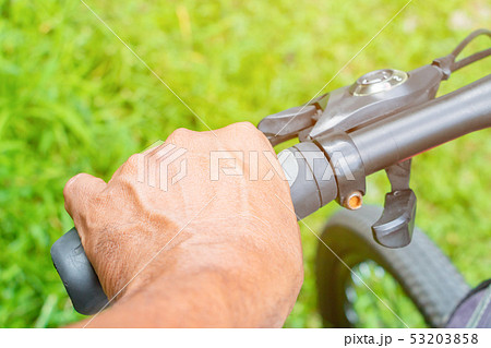 hand cyclist hold handle bike hand cyclist hold handle bike 53203858