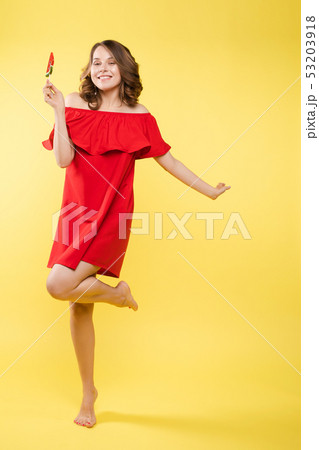 Seductive woman like sweet doll with candy. 53203918