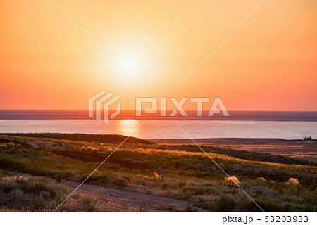 Beautiful view of sunset at salt lake Baskunchak in Astrakhan region, Russia 53203933