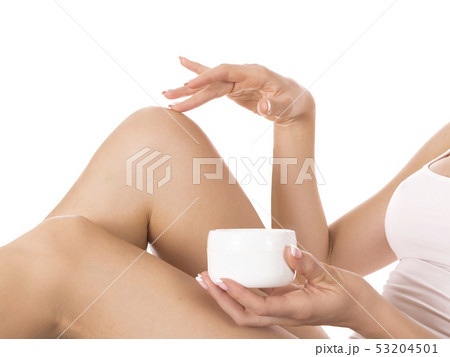 Care for female legs isolated on white background. Skin care and health concept. Care for female legs isolated on white background. Skin care and health concept. 53204501