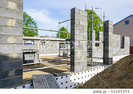Concrete foundation of a new house, view of construction site in preparation process Concrete foundation of a new house, view of construction site in preparation process 53205355