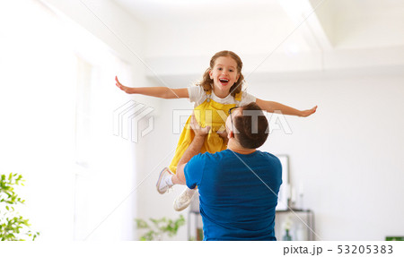 Father's day. Happy family daughter hugs his dad 53205383