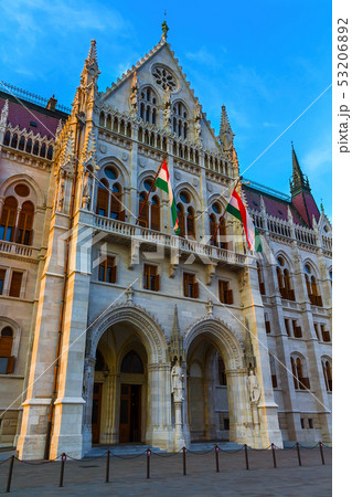 Parliament in Budapest with two flags of Hungary 53206892