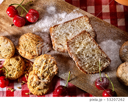 Oatmeal cookies snack and cherry breakfast close up 53207262
