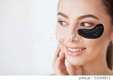 Skin Care Mask. Woman With Black Patches 53209071