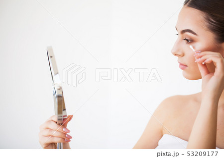 Beauty Face Care. Girl With Healthy Skin Looking In The Mirror 53209177