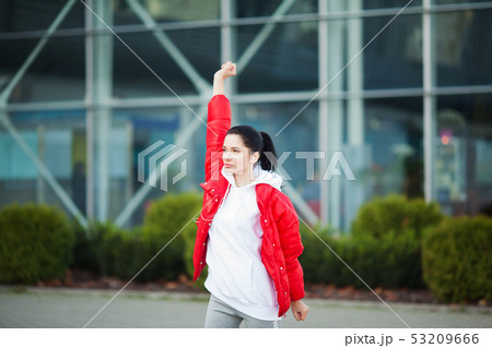 Fitness. Beautiful young woman doing exercises in the park Fitness. Beautiful young woman doing exercises in the park 53209666