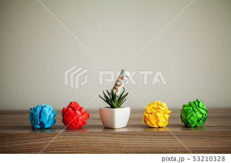 Creative idea concept.Inspiration, New idea and Innovation concept with Crumpled Paper on wood 53210328