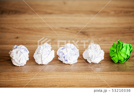 Creative idea concept.Inspiration, New idea and Innovation concept with Crumpled Paper on wood 53210336